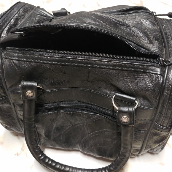 Leather look zippered bag. 10 inches long. 7 inches high and 6 inches wide. - Picture 2 of 5